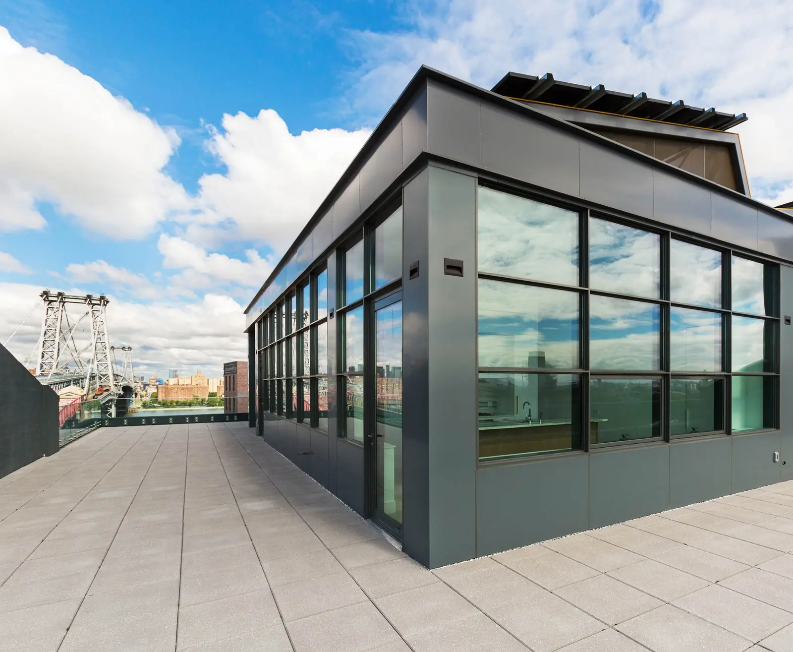 338 Berry: the rooftop penthouse addition, with the Williamsburg Bridge behind
